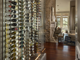 Contemporary glass wine wall cellar, custom design & install by Innovative Wine Cellar Designs.