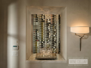 Contemporary glass wine wall cellar, custom design & install by Innovative Wine Cellar Designs.