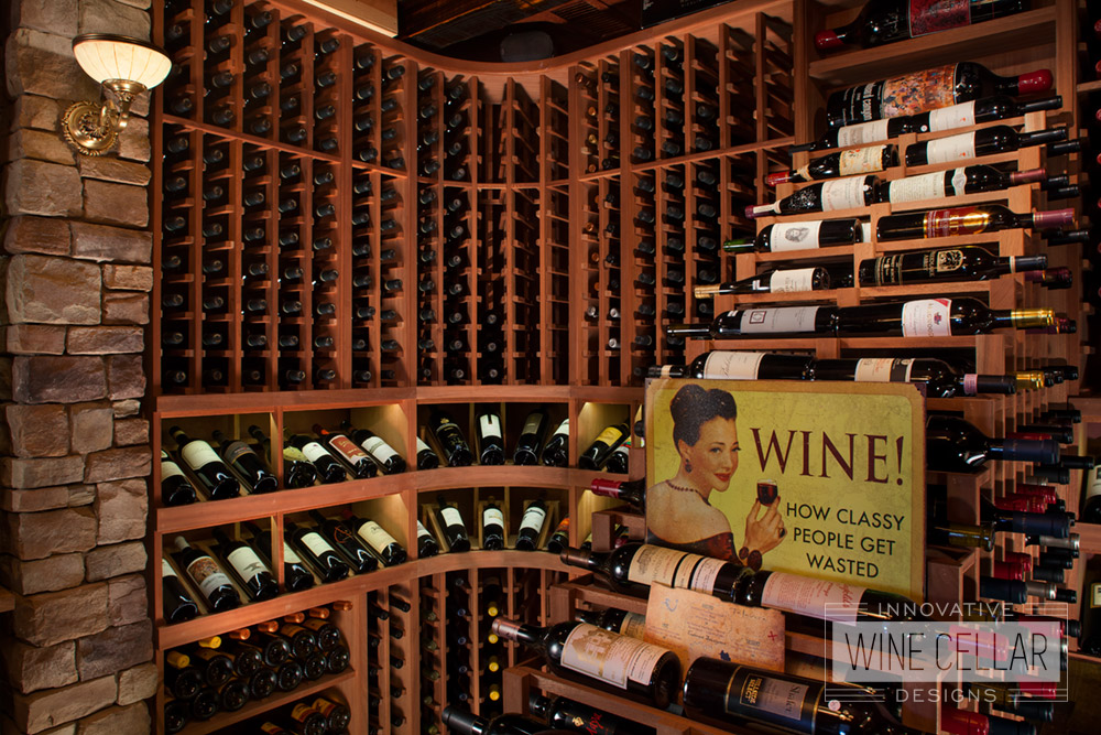 Traditional mahogany wine cellar, custom design & install by Innovative Wine Cellar Designs.