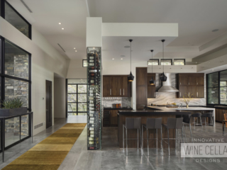 Modern kitchen wine wall cellar, custom design & install by Innovative Wine Cellar Designs.