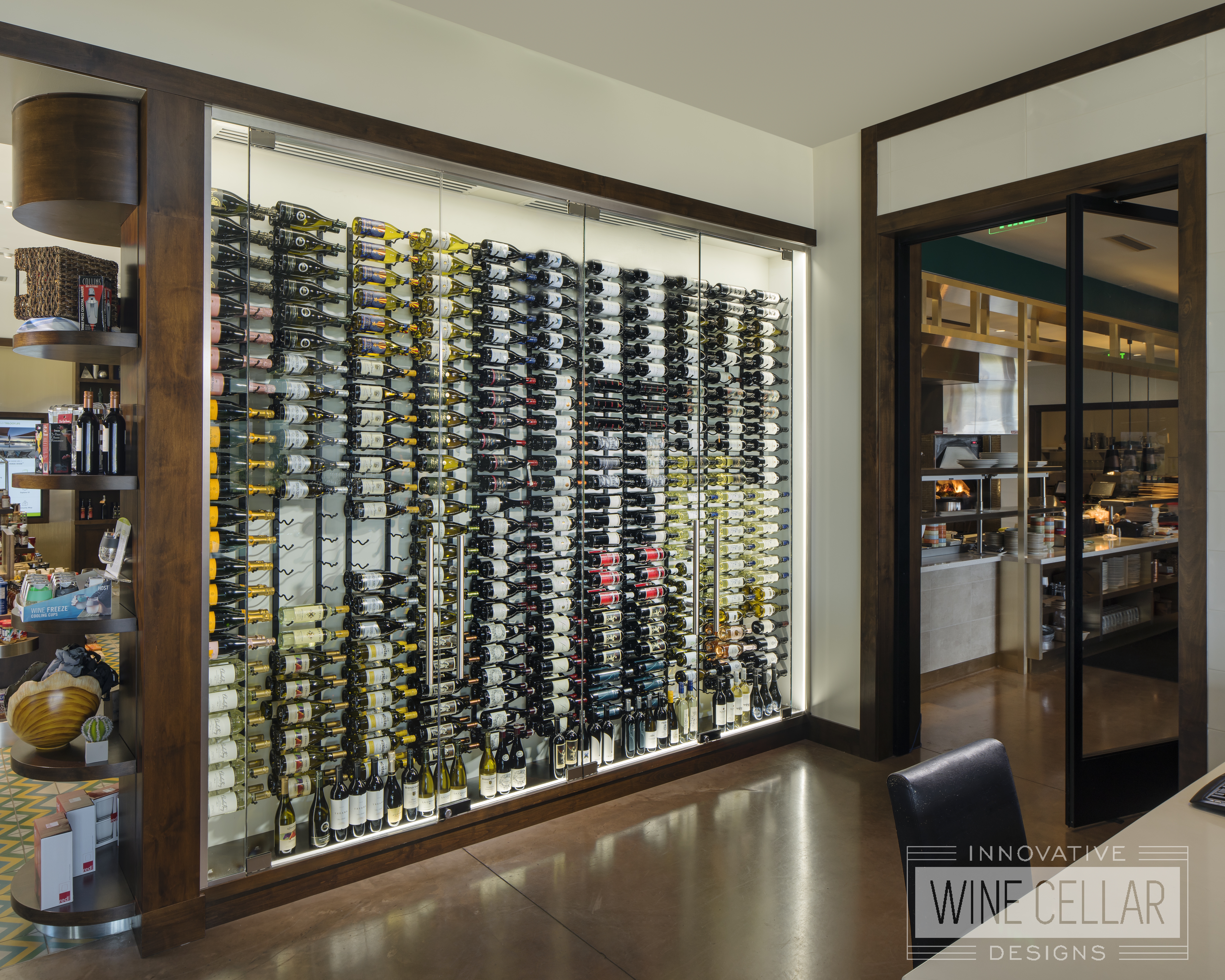 glass wine wall in clubhouse shop